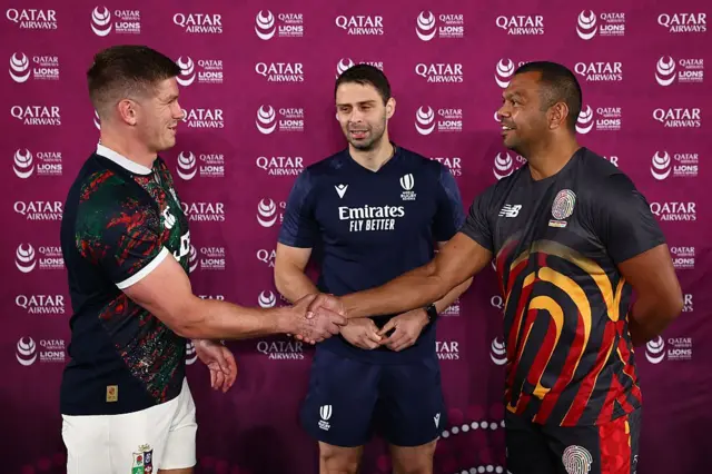 Owen Farrell of the British and Irish Lions and Kurtley Beale of the First Nations and Pasifika XV at the coin toss ahead of the match. 