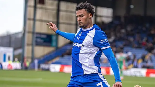 Kane Taylor in action for Oldham Athletic