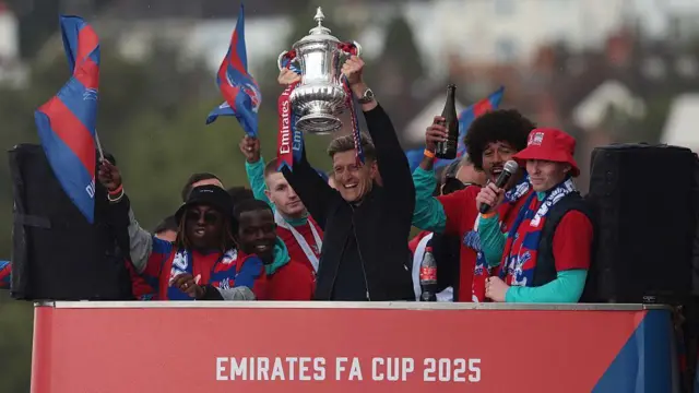 Steve Parish lifts the FA Cup trophy