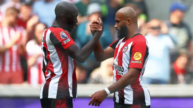 Brentford players celebrate a goal