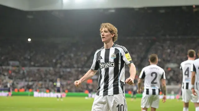 Anthony Gordon celebrates after scoring