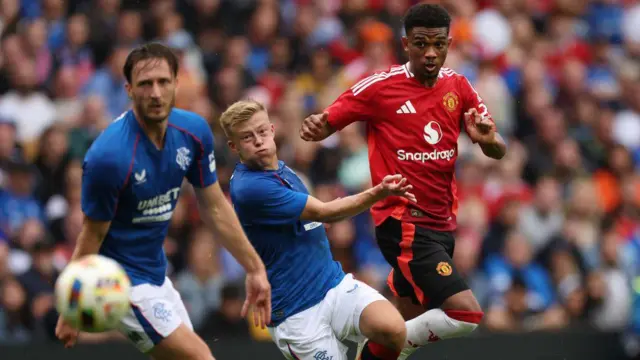 Amad Diallo scores Manchester United's first goal against Rangers