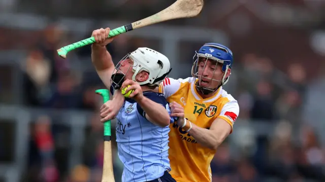 Antrim's James McNaughton challenges Andrew Dunphy