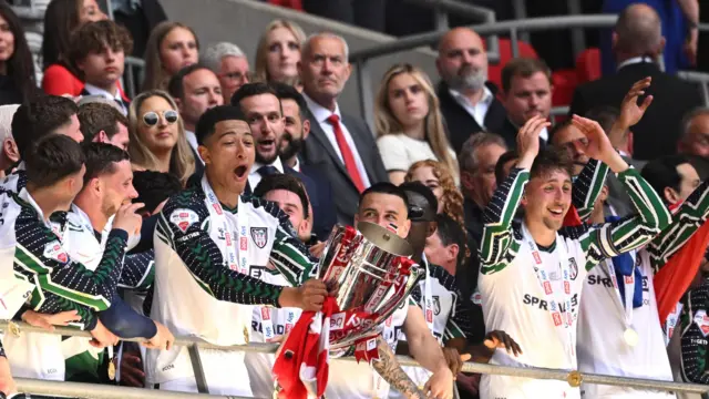 Sunderland's Jobe Bellingham lifting the Championship play-off trophy