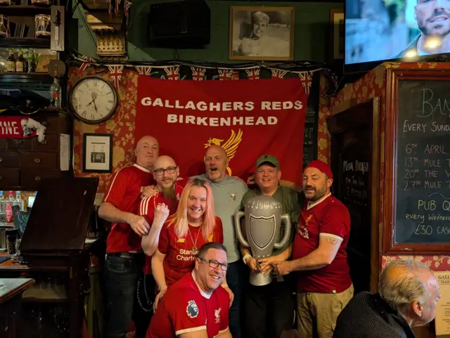 Fans with a flag in Birkenhead