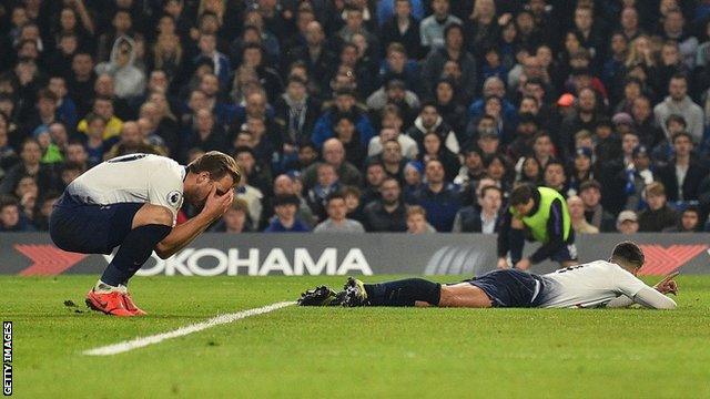 Tottenham players reacting during their defeat to Chelsea