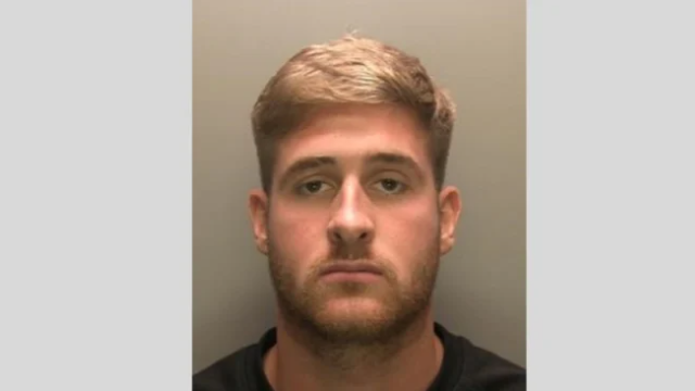 A mug shot of Jayden Deaken. He has stubble and blonde short hair.