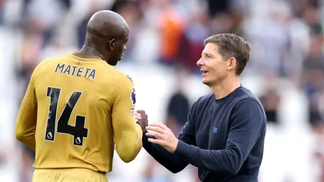 Oliver Glasner with Jean-Philippe Mateta after match