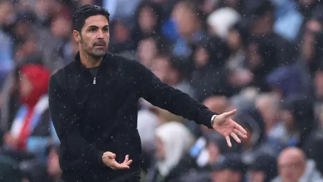 Mikel Arteta manager / head coach of Arsenal reacts after Leandro Trossard of Arsenal receives a red card for a second yellow during the Premier League match between Manchester City FC and Arsenal FC at Etihad Stadium