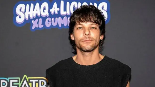 Louis Tomlinson at Shaquille O'Neal's Super Bowl party
