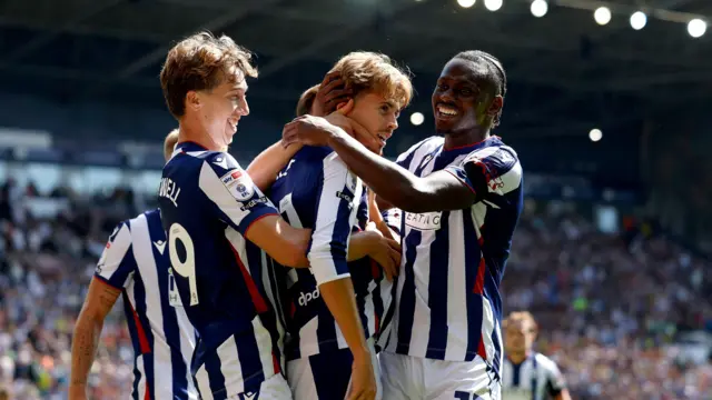Isaac Price, Harry Whitwell and Ousmane Diakite all celebrate Price's penalty conversion in West Bromwich Albion's win against Burnley on Sunday