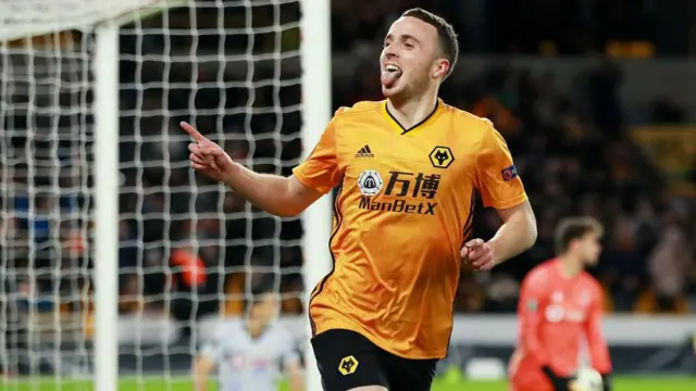 Diogo Jota celebrates scoring while playing for Wolves