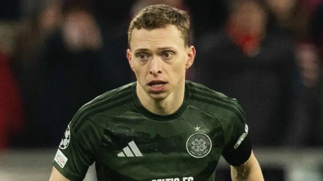 Celtic's Alistair Johnston in action during the UEFA Champions League 2024/25 League Knockout Play-off second leg match between FC Bayern Munich and Celtic at the Allianz Arena