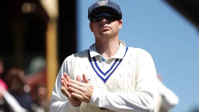 Steve Smith looks on