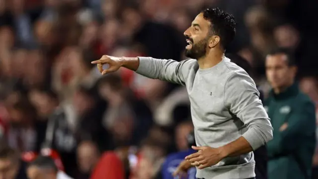 Ruben Amorim gestures from the touchline