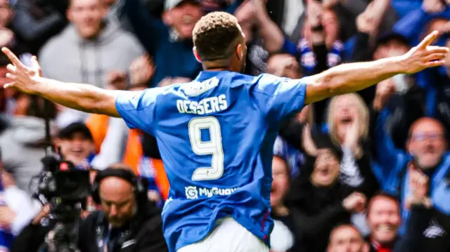 Rangers' Cyriel Dessers celebrates as he scores to make it 1-0 during a William Hill Premiership match between Rangers and Celtic at Ibrox Stadium
