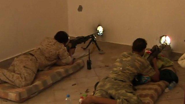 Snipers fire at 'Islamic State' positions