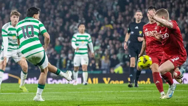 Celtic's Nicolas Kuhn scores against Aberdeen