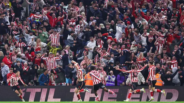 Daniel Ballard of Sunderland celebrates scoring against Coventry