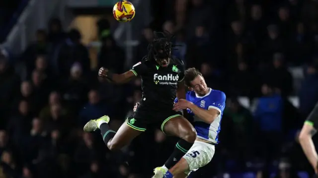 Ben Davies of Birmingham City challenges Promise Omochere of Bristol Rovers