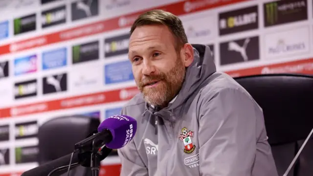 Simon Rusk speaks to the media as Southampton interim manager