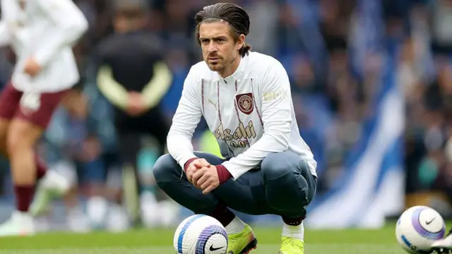 Jack Grealish of Manchester City looks on during the warm up prior to the Premier League match between Everton FC and Manchester City FC at Goodison Park