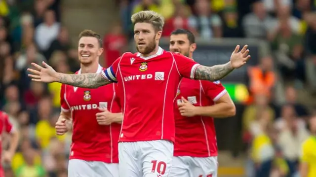 Wrexham forward Josh Windass celebrates