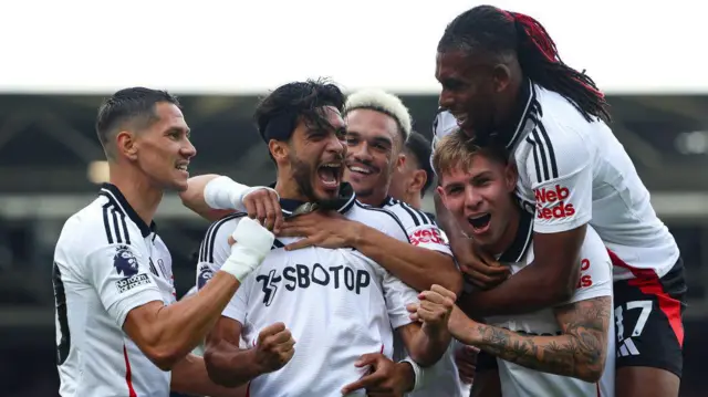 Raul Jimenez celebrates with his team mates after scoring Fulham's first goal during the match between Fulham and Newcastle United at Craven Cottage.