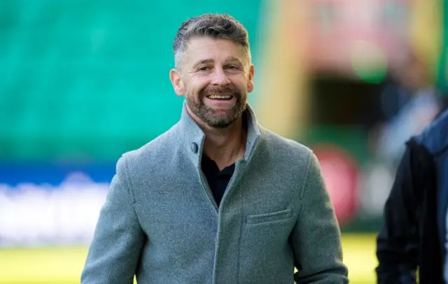 St Mirren boss Stephen Robinson smiling as he arrives at Easter Road.