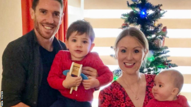 Cheltenham Town captain Ben Tozer with his wife Sophie and their two children Hugo, two, and seven-month-old Felicity