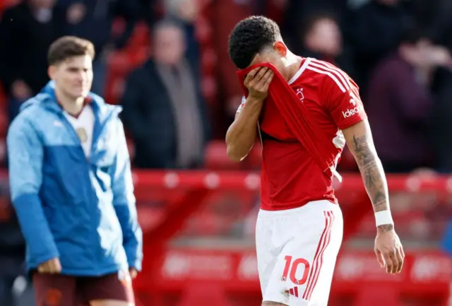 Morgan Gibbs-White with head in hands