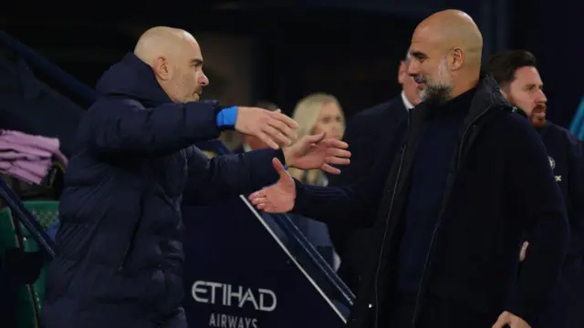 Pep Guardiola greets Enzo Maresca during a Premier League match