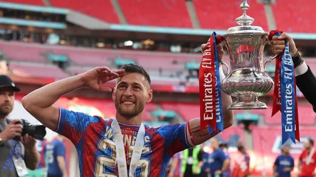 Joel Ward celebrates with FA Cup trophy