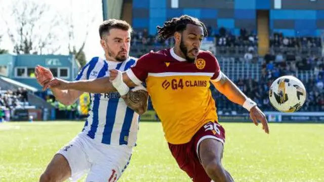 Motherwell's Dom Thompson and Kilmarnock's Daniel Armstrong