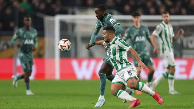 Pape Sarr battles for possession during Tottenham's Europa League game at Ferencvaros