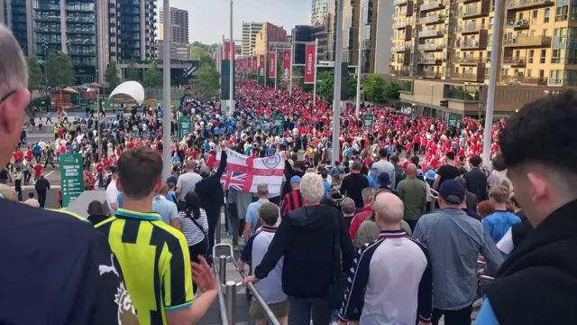A picture of Wembley Way full of people