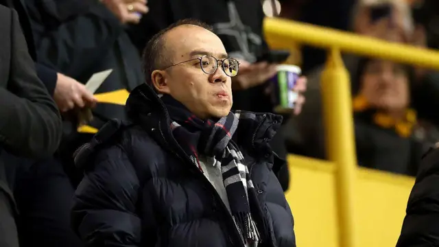 Wolves CEO Jeff Shi looks on from the stands at Molineux