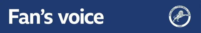 Millwall fan's voice banner on a blue background with the club badge in the far right corner