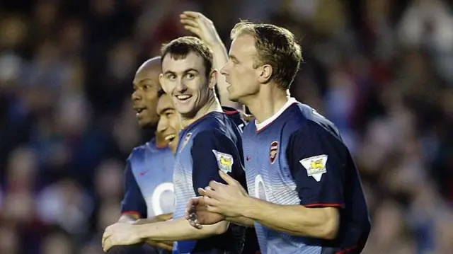 Francis Jeffers celebrates scoring with Dennis Bergkamp