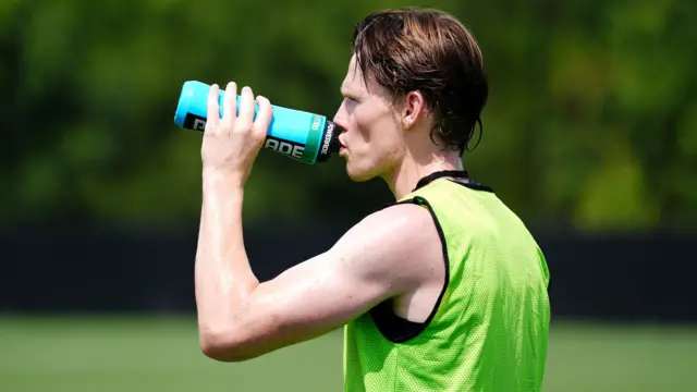 Scotland's Scott McTominay takes on water during a training session at the Atrium Health Training Ground in Charlotte, North Carolina.