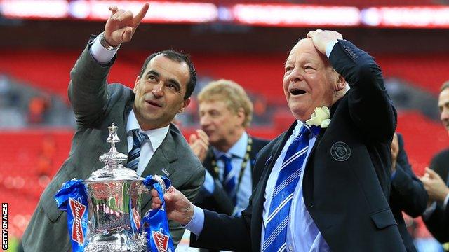 Roberto Martinez holds the FA Cup trophy with Dave Whelan after Wigan's 1-0 FA Cup final win against Manchester City in 2013