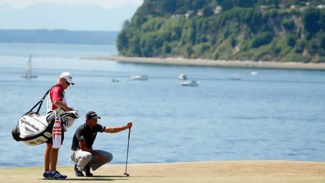 Jason Day lines up a shot