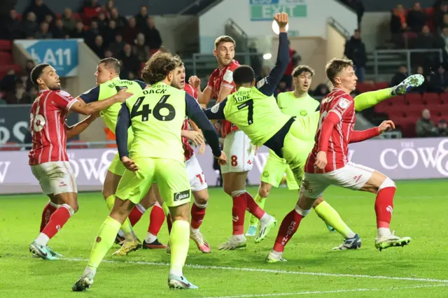 Sunderland's Ballard, Dack, Jobe and Hume jostle for position with Bristol City players in their box 