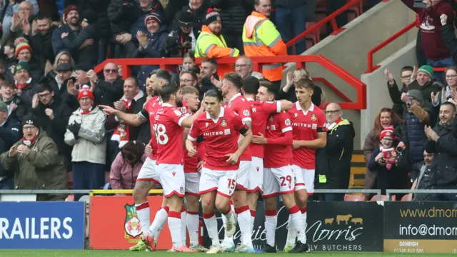 Wrexham players celebrate against Mansfield last weekend