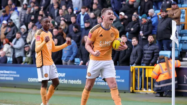 Callum Doyle of Leicester City celebrates after the final whistle of the Emirates FA Cup Third Round match between Millwall and Leicester City at The Den