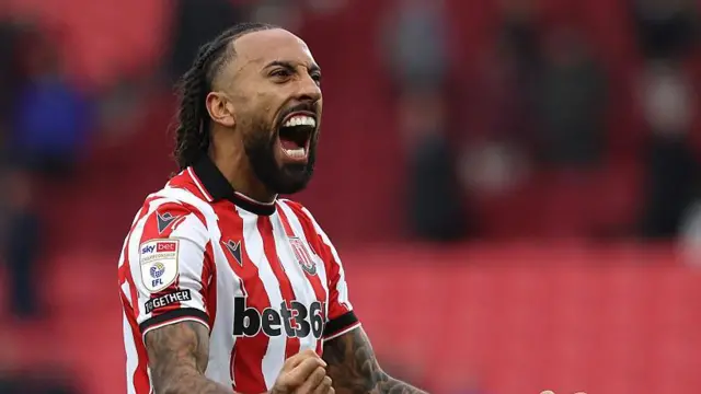 Sorba Thomas celebrates