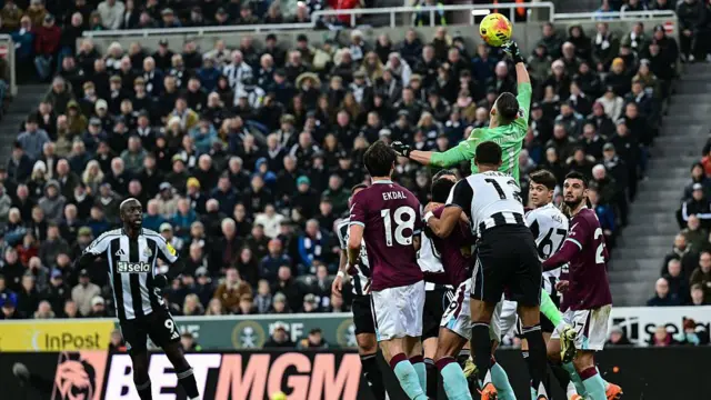 Burnley goalkeeper Martin Dubravka punches the ball clear