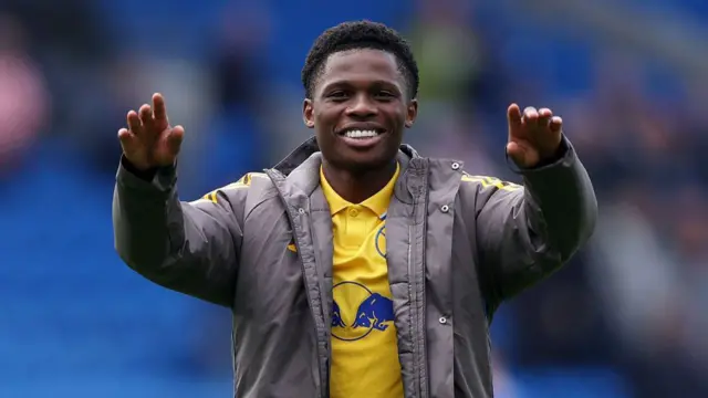 Largie Ramazani of Leeds United celebrates victory in front of the Leeds United fans after the Sky Bet Championship match between Cardiff City FC and Leeds United FC at Cardiff City Stadium