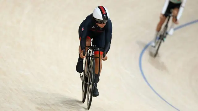 Neah Evans of Team Great Britain competes during the Women's Omnium, Scratch Race 1/4 on day sixteen of the Olympic Games Paris 2024 at Saint-Quentin-en-Yvelines Velodrome 