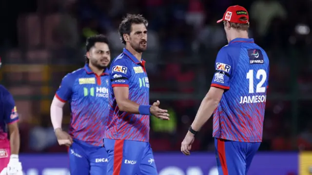 Mitchell Starc celebrates a wicket